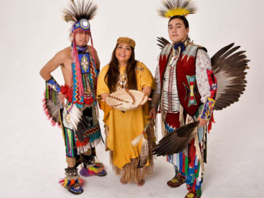 Jacque Nunez and her family in Native American clothing