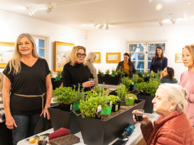 Guests learn how to plant herbs in a workshop class at Casa Romantica